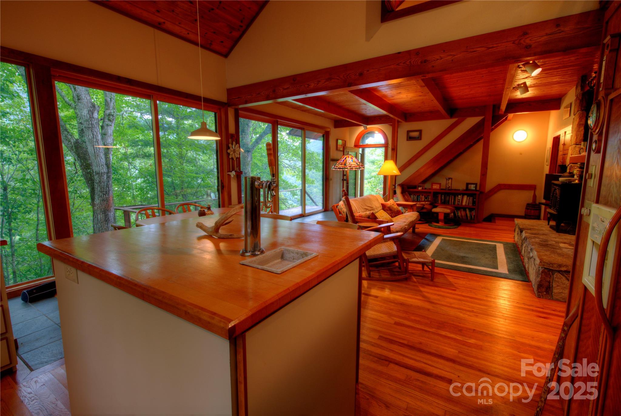 565 Silver Ridge Road Bryson City, NC 28713 - Photo 13 of 38 a view of a patio with swimming pool