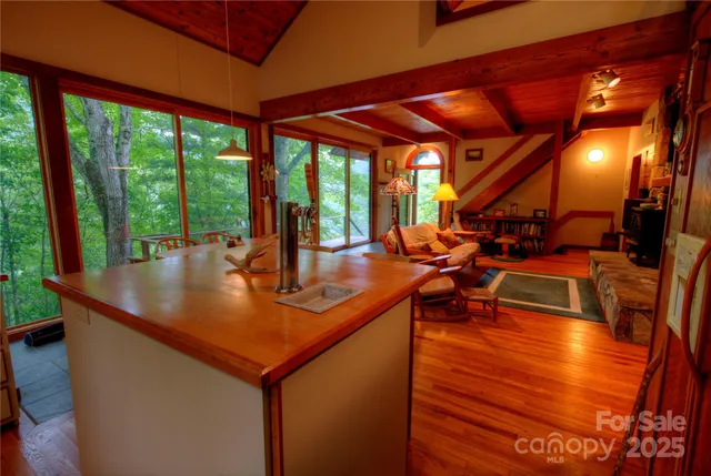 a balcony with trees in front of it