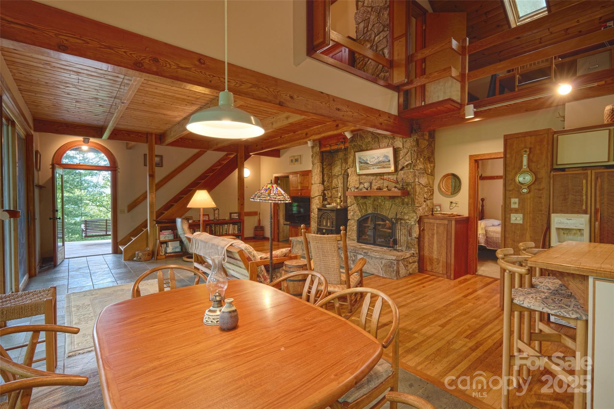 565 Silver Ridge Road Bryson City, NC 28713 - Photo 37 of 38 a room with table and chairs