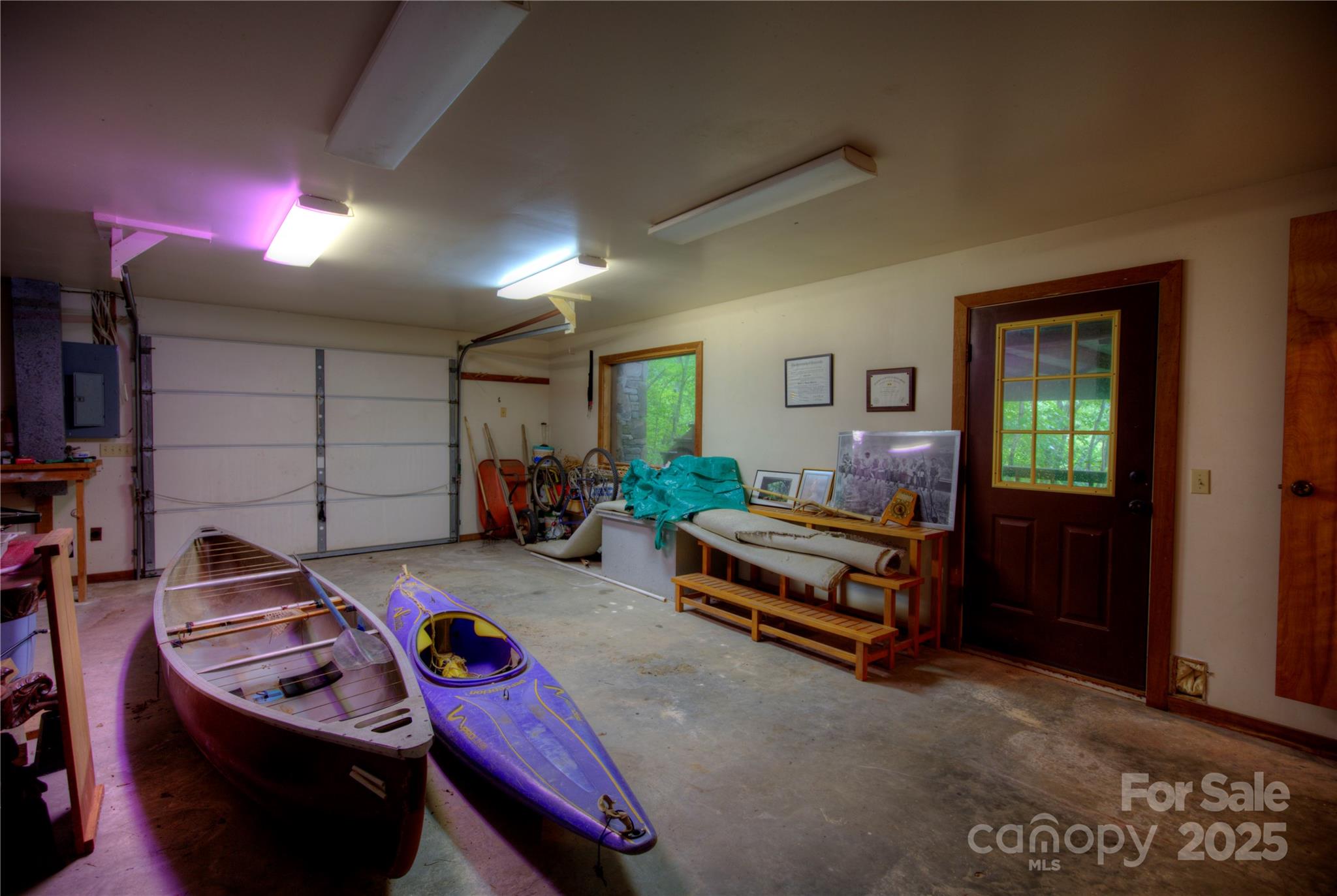 565 Silver Ridge Road Bryson City, NC 28713 - Photo 41 of 45 a bedroom with furniture and a lamp