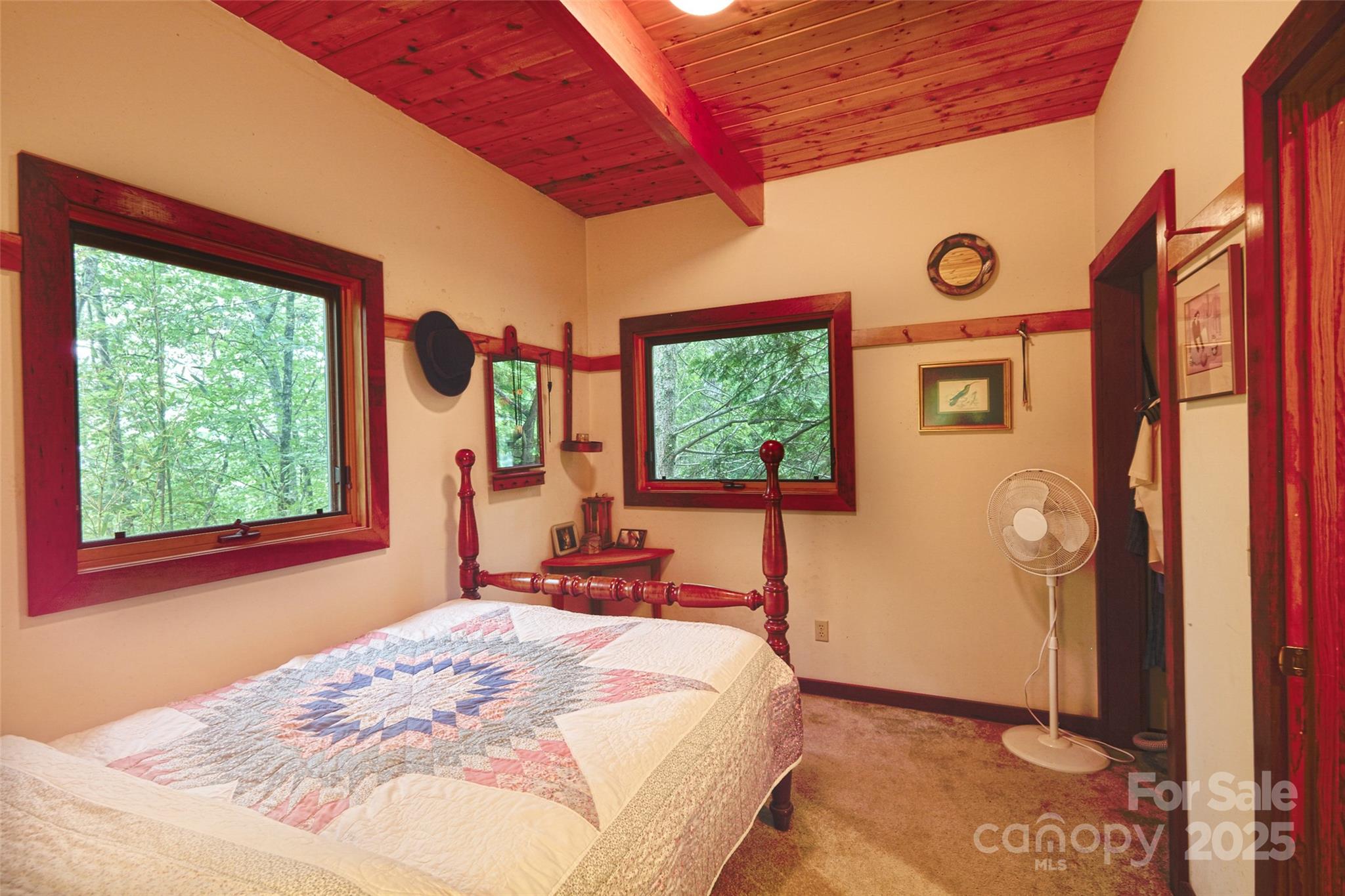 565 Silver Ridge Road Bryson City, NC 28713 - Photo 44 of 45 a bed room with a bed and a window