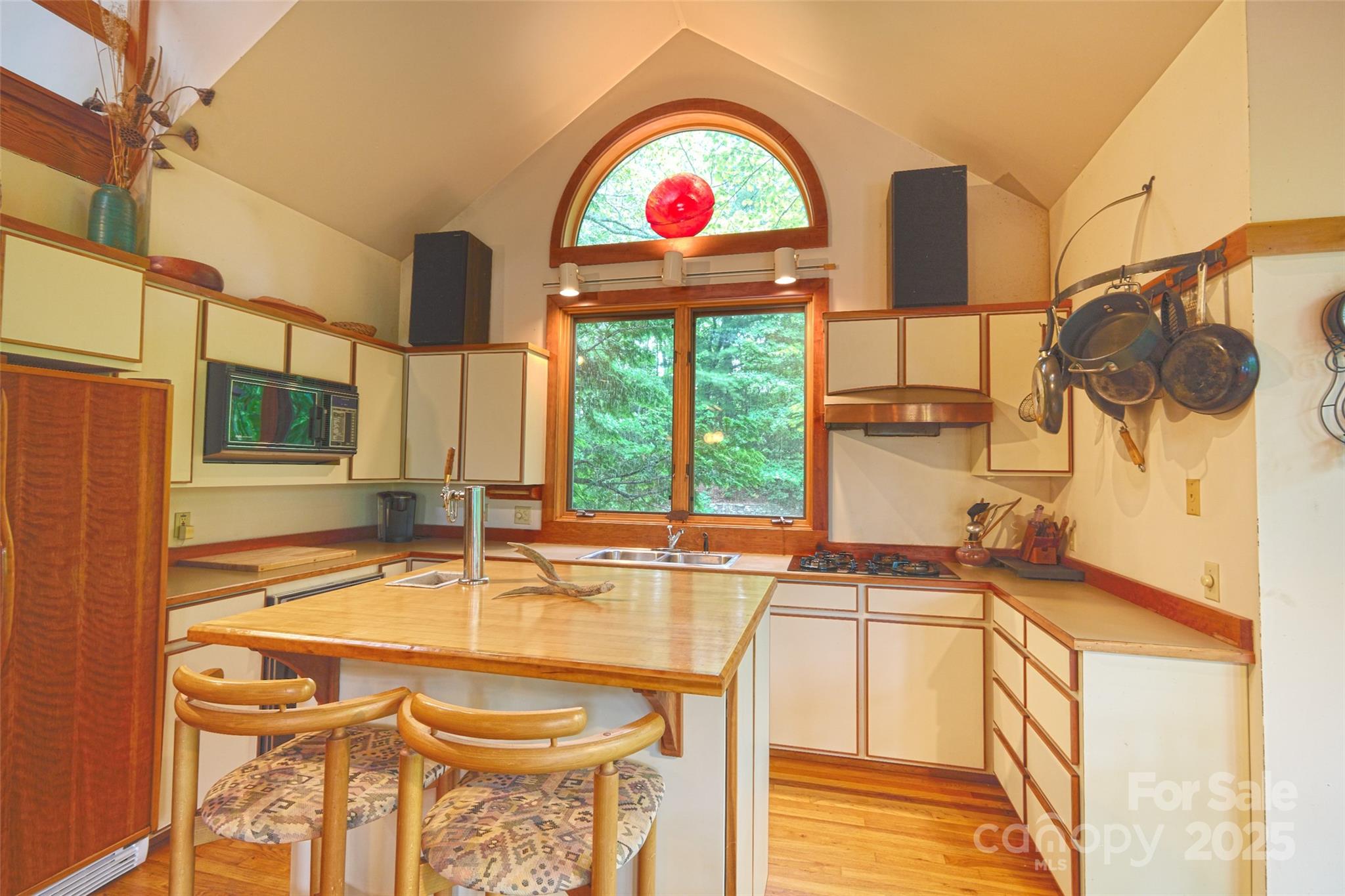 565 Silver Ridge Road Bryson City, NC 28713 - Photo 45 of 45 a view of a bathroom with a sink and a window