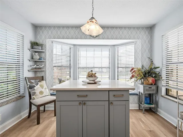 a living room filled with furniture and a fireplace