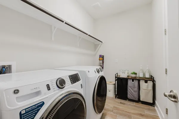 a utility room with dryer and washer