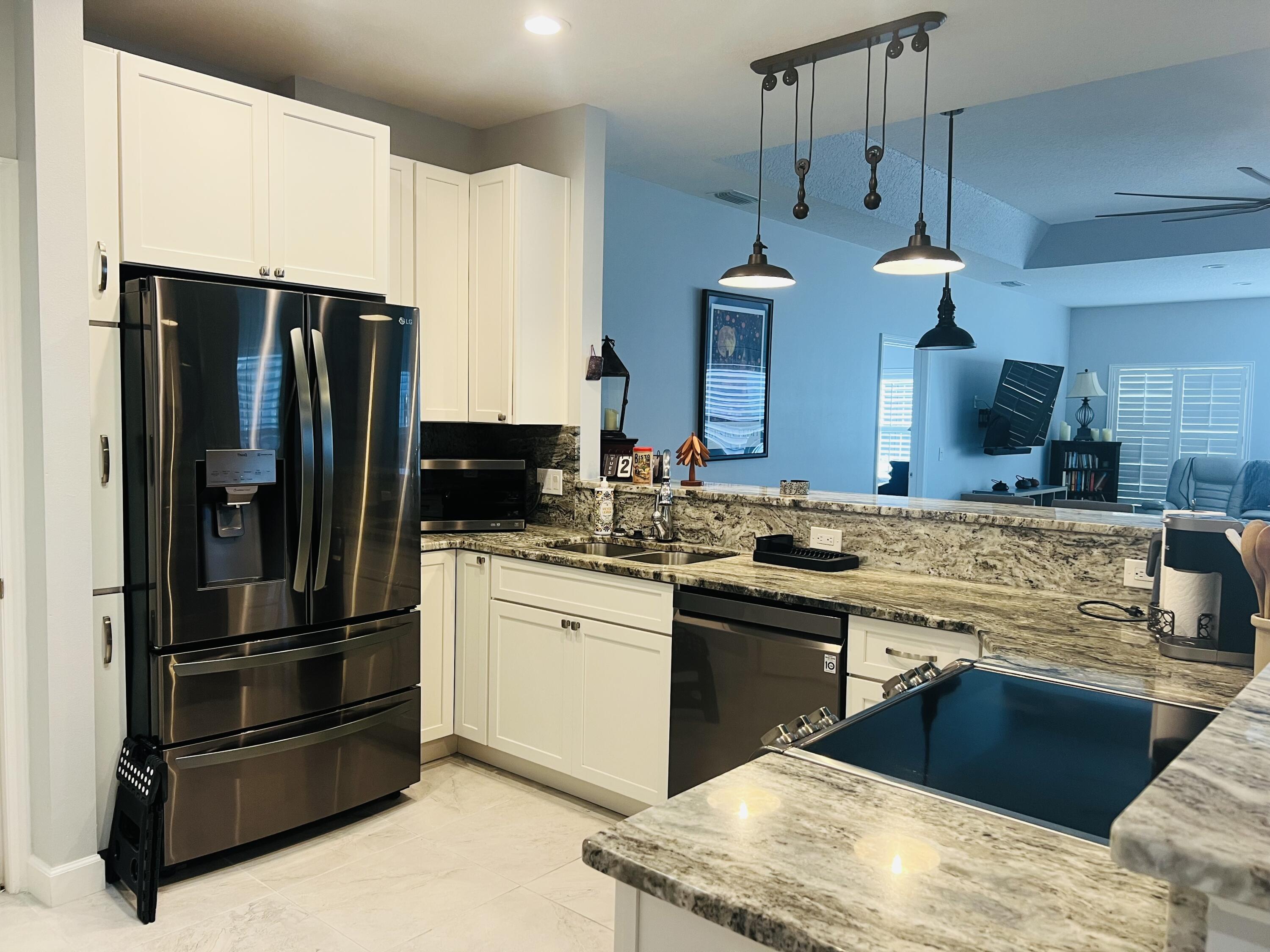 4042 Gator Trace Road Fort Pierce, FL 34982 - Photo 4 of 26 granite counters
