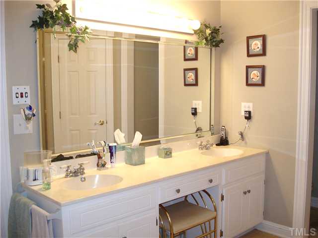 4083 Massengale Road Whitakers, NC 27891 - Photo 13 of 17 Huge master bath area with double vanity and double closets....built-in storage cabinets and hamper.