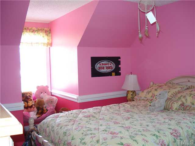 4083 Massengale Road Whitakers, NC 27891 - Photo 15 of 17 Bedroom up has dormer window w/ window seat.