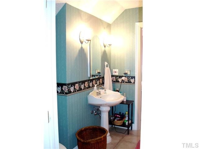 4083 Massengale Road Whitakers, NC 27891 - Photo 17 of 17 Upstairs bathroom opens into the loft area and bedroom.