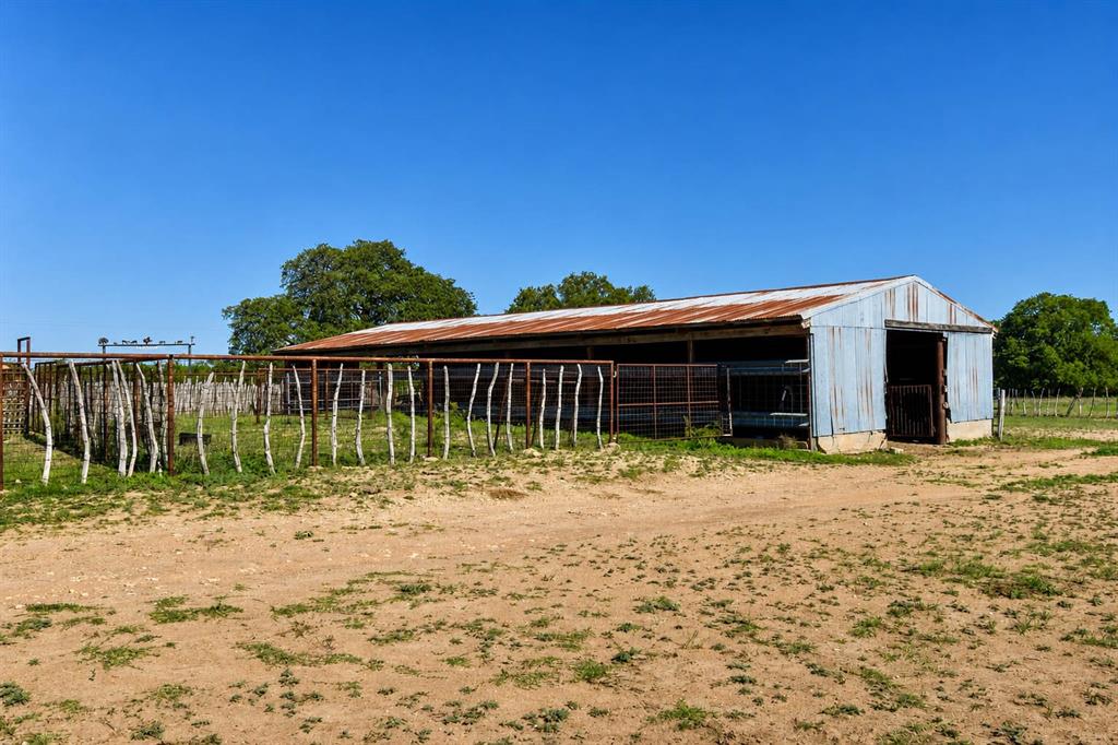 8228 Us Highway Rochelle, TX 76872 - Photo 28 of 36 a view of a house with a yard