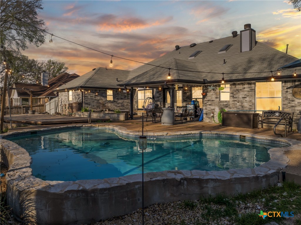 711 Mueller Street Copperas Cove, TX 76522 - Photo 1 of 48 a view of a house with swimming pool