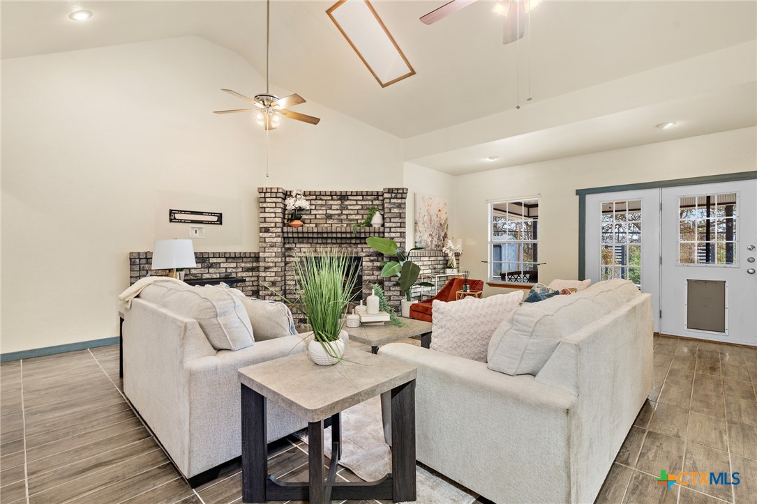 711 Mueller Street Copperas Cove, TX 76522 - Photo 11 of 48 a living room with furniture and a table