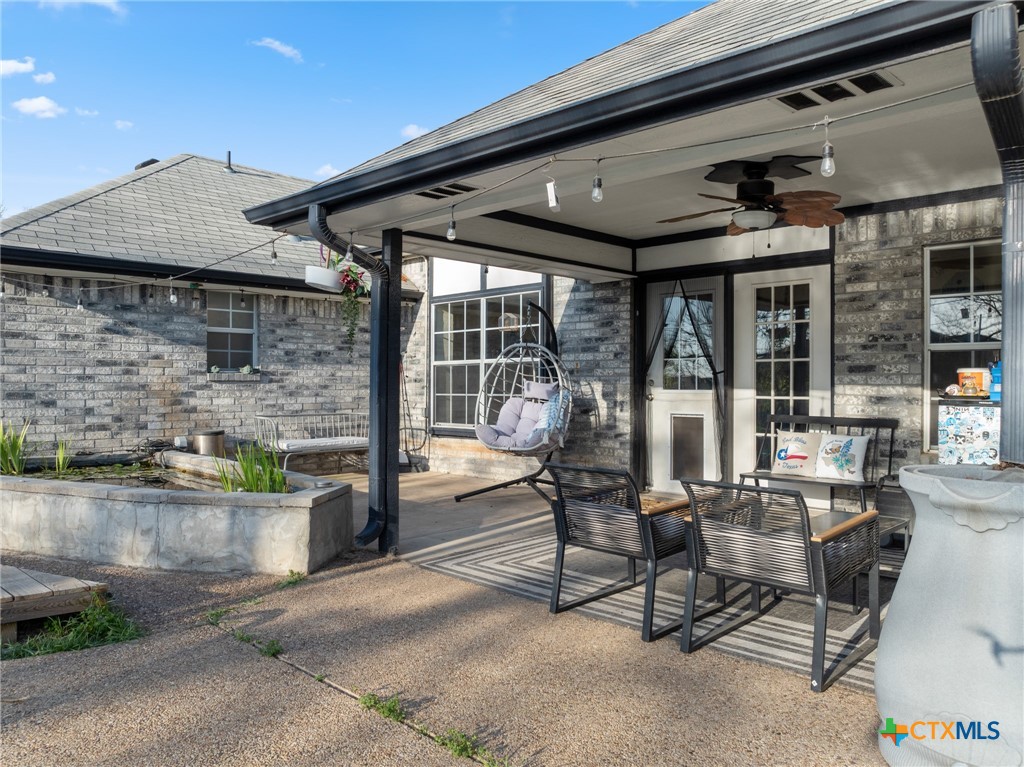 711 Mueller Street Copperas Cove, TX 76522 - Photo 36 of 48 a building outdoor space with patio furniture and potted plants