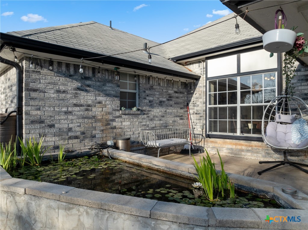 711 Mueller Street Copperas Cove, TX 76522 - Photo 37 of 48 a front view of a house with garden