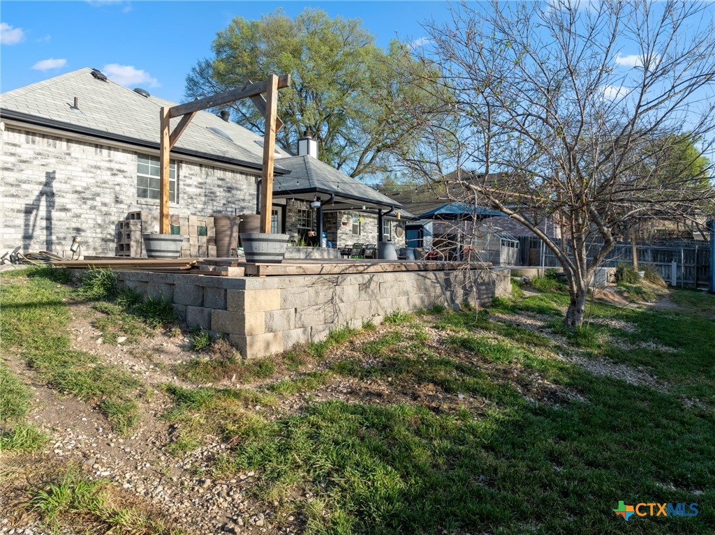 711 Mueller Street Copperas Cove, TX 76522 - Photo 40 of 48 a view of a house with a yard and sitting area