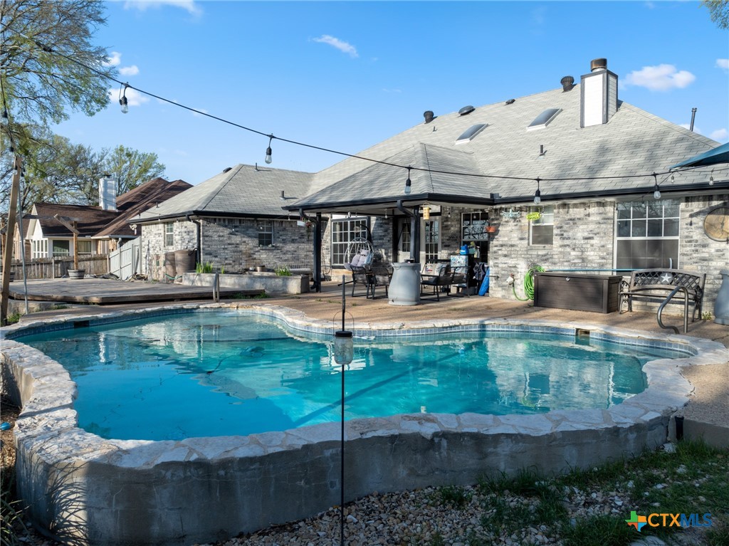 711 Mueller Street Copperas Cove, TX 76522 - Photo 42 of 48 a view of a house with swimming pool