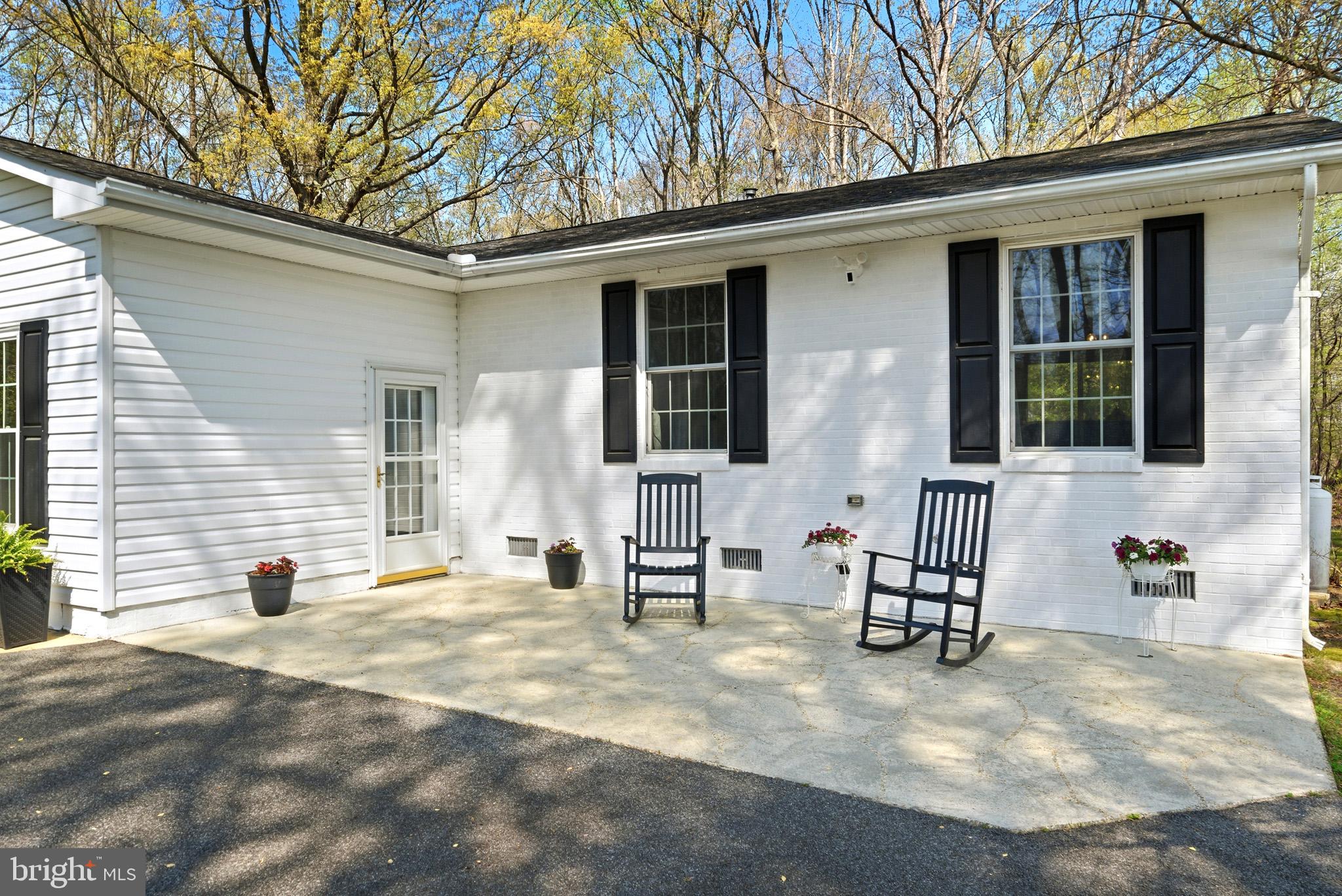 7219 Carrico Mill Road Hughesville, MD 20637 - Photo 3 of 41 a front view of a house with patio