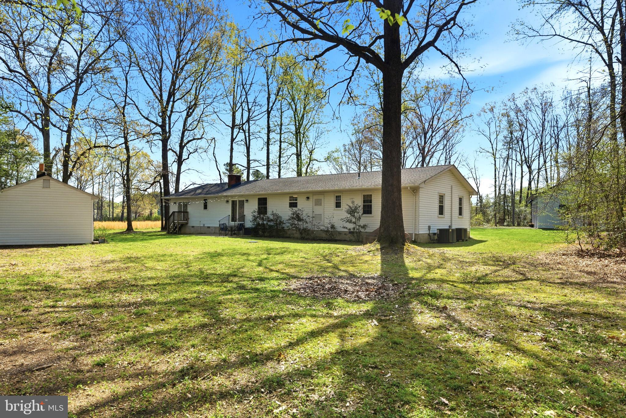 7219 Carrico Mill Road Hughesville, MD 20637 - Photo 33 of 41 a view of a house with backyard and tree