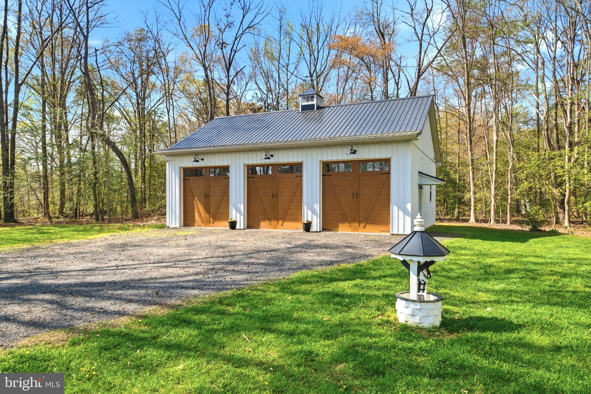 7219 Carrico Mill Road Hughesville, MD 20637 - Photo 37 of 41 a front view of a house with a yard and trees