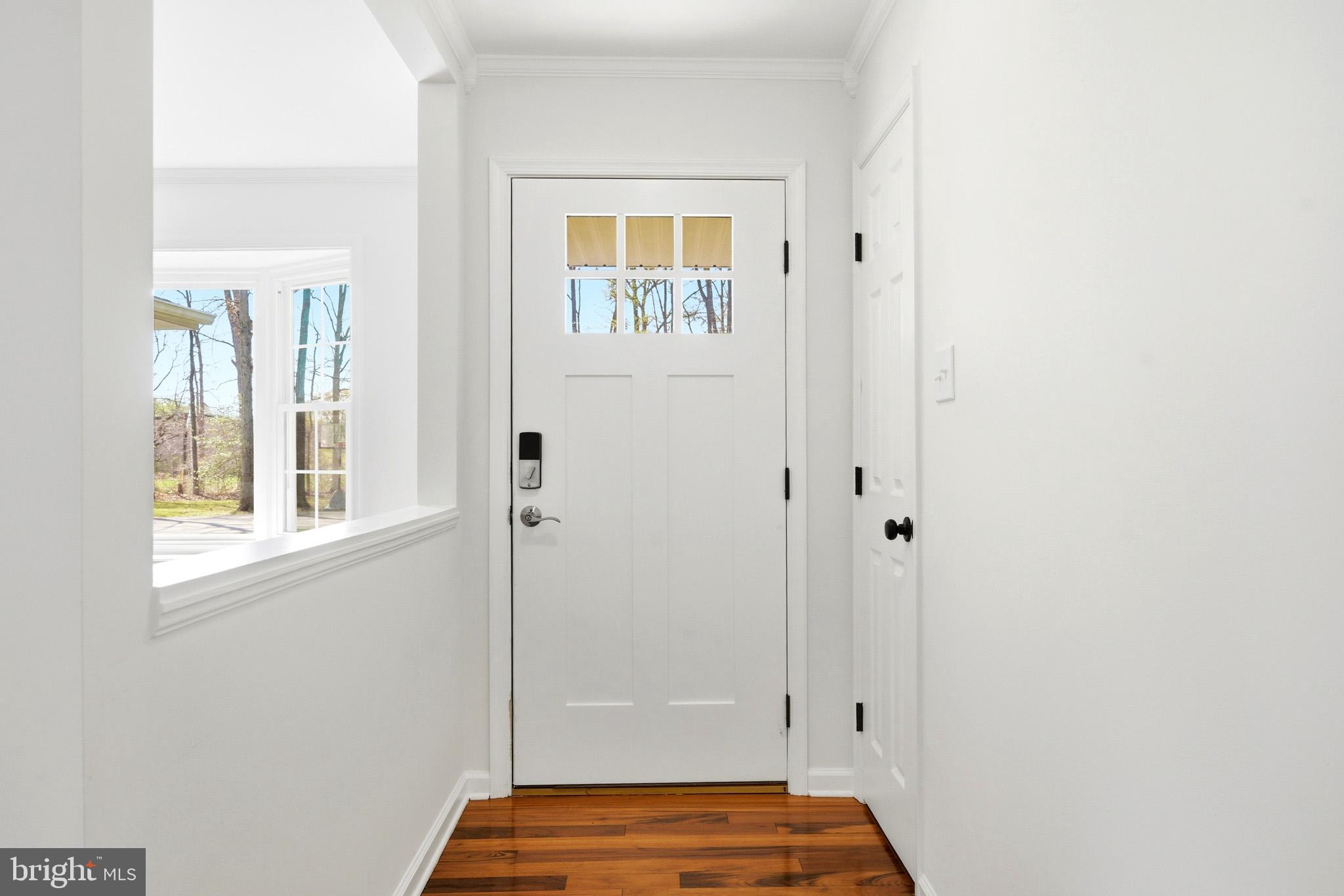 7219 Carrico Mill Road Hughesville, MD 20637 - Photo 5 of 41 a view of front door with wooden floor