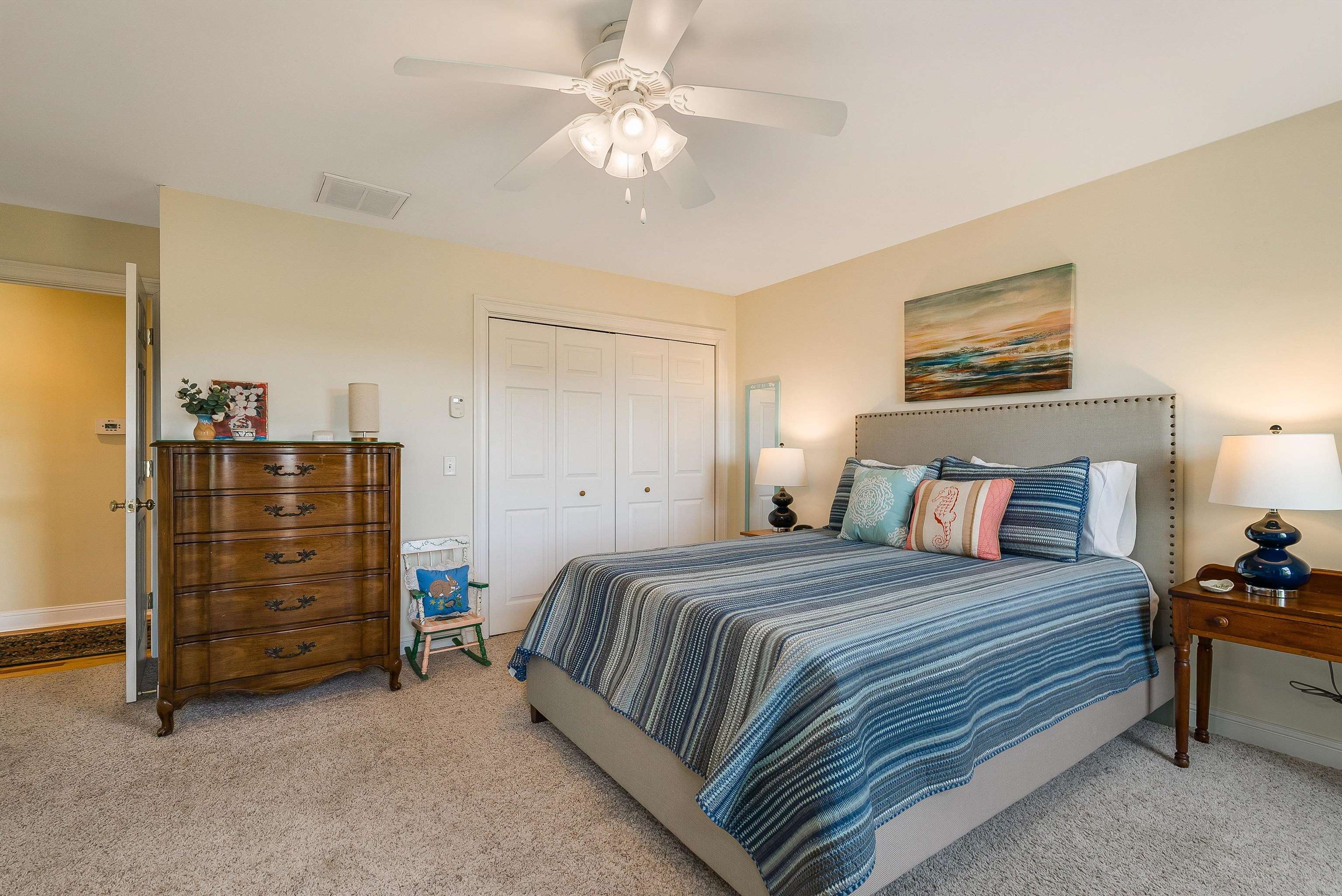 3525 Traveler Road Harrisonburg, VA 22801 - Photo 49 of 72 a bedroom with a bed and a chandelier