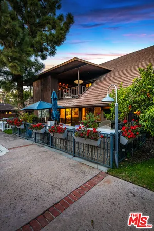 a view of outdoor space yard deck patio and fire pit