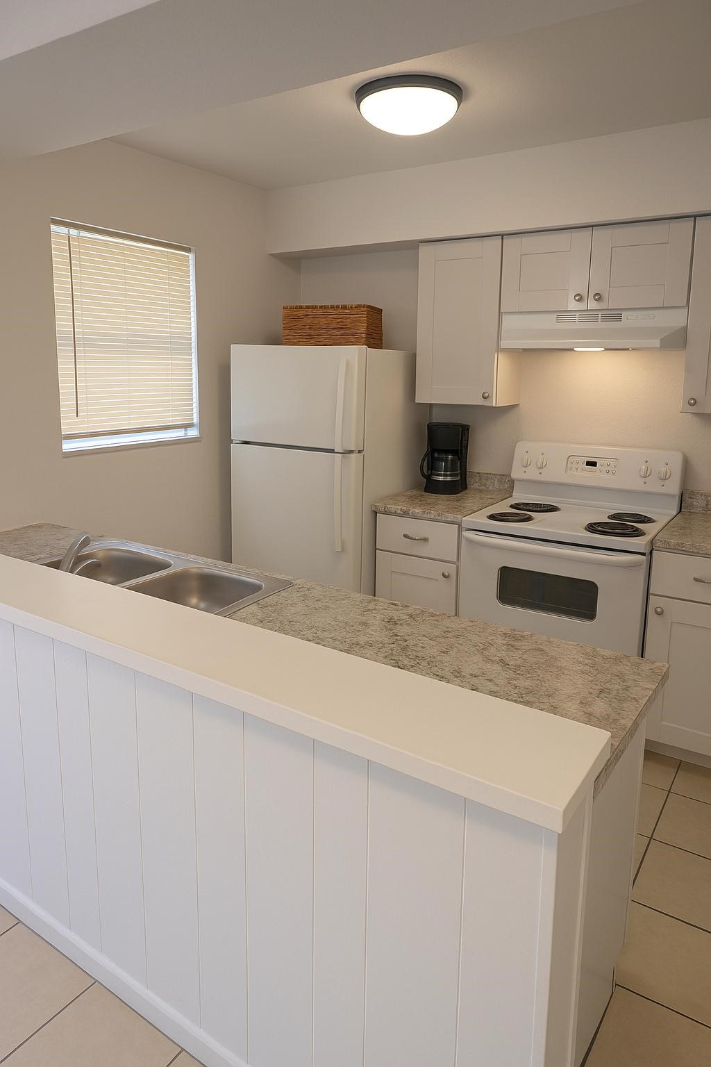 600 Hilliard Street, Unit 2 Conroe, TX 77301 - Photo 2 of 21 a kitchen with a stove and a refrigerator