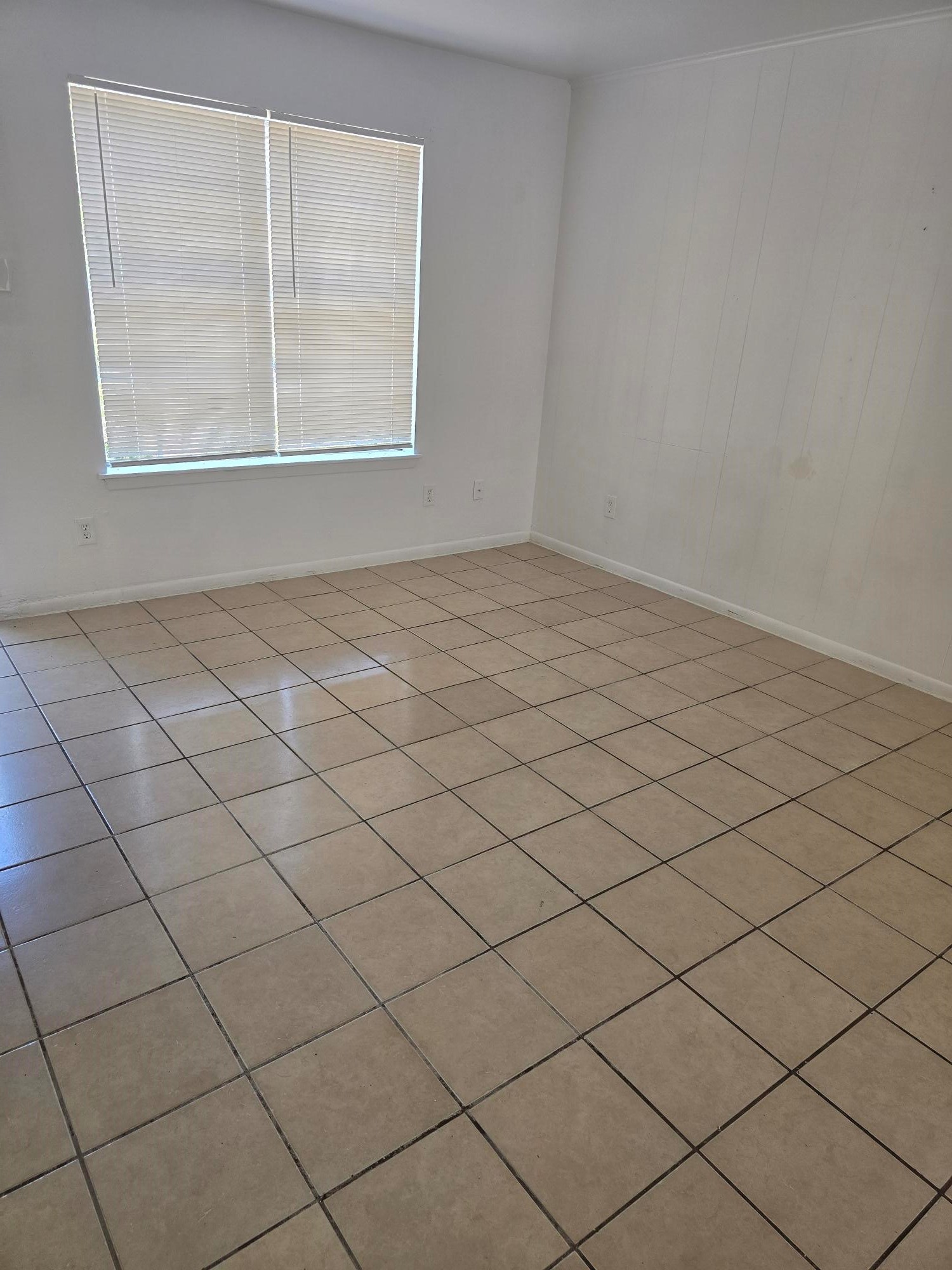 600 Hilliard Street, Unit 2 Conroe, TX 77301 - Photo 5 of 21 a view of a room and window