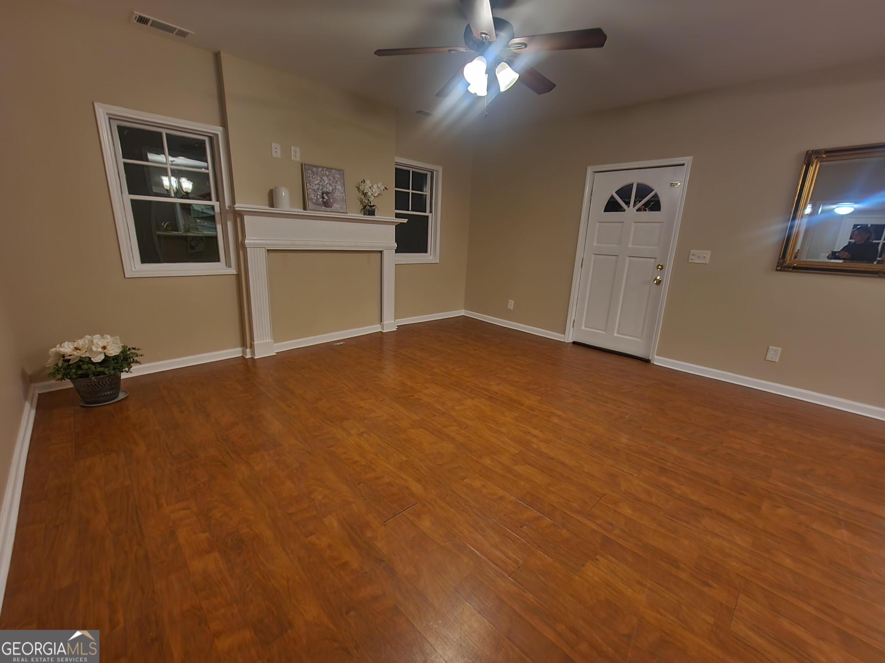2125 Westbrook Road Commerce, GA 30530 - Photo 10 of 25 a view of an empty room with a window