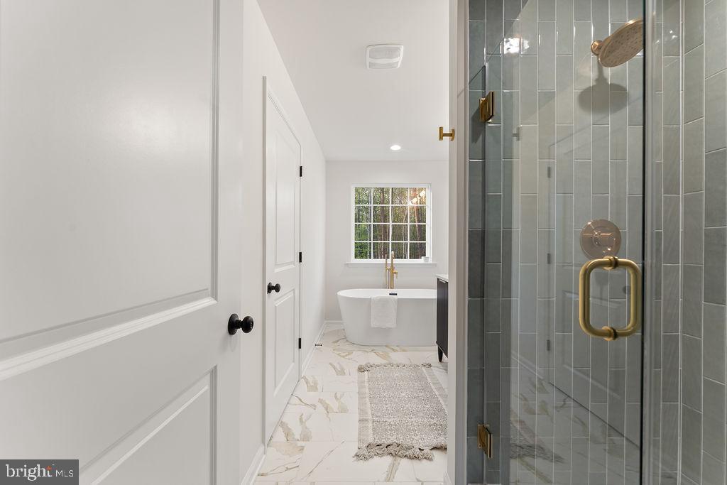 729 Vawter Corner Road Louisa, VA 23093 - Photo 20 of 50 a bathroom with a shower and a sink
