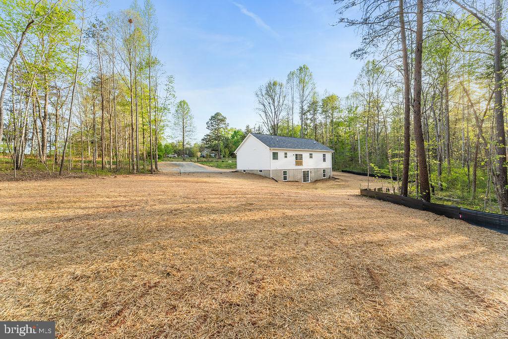 729 Vawter Corner Road Louisa, VA 23093 - Photo 2 of 50 a car parked in front of a building