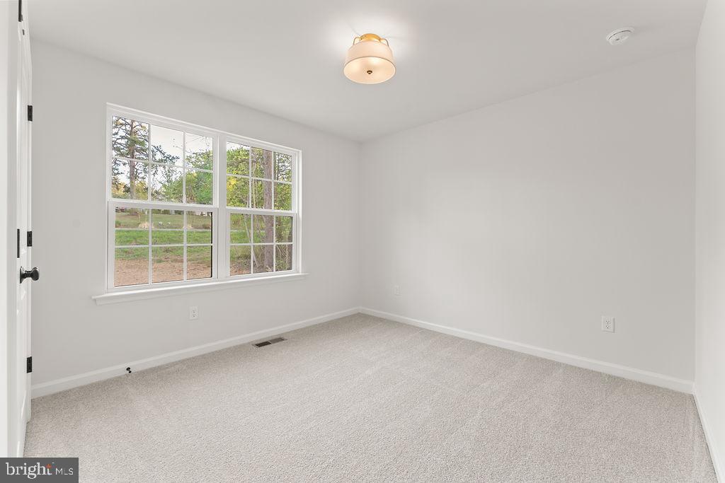729 Vawter Corner Road Louisa, VA 23093 - Photo 22 of 50 an empty room with a window