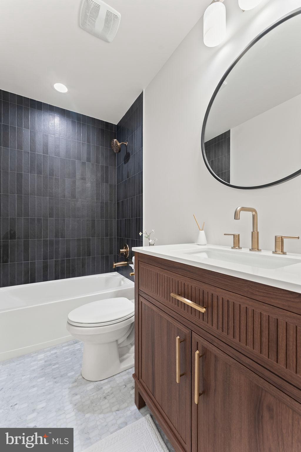 729 Vawter Corner Road Louisa, VA 23093 - Photo 27 of 50 a bathroom with a sink a toilet and shower