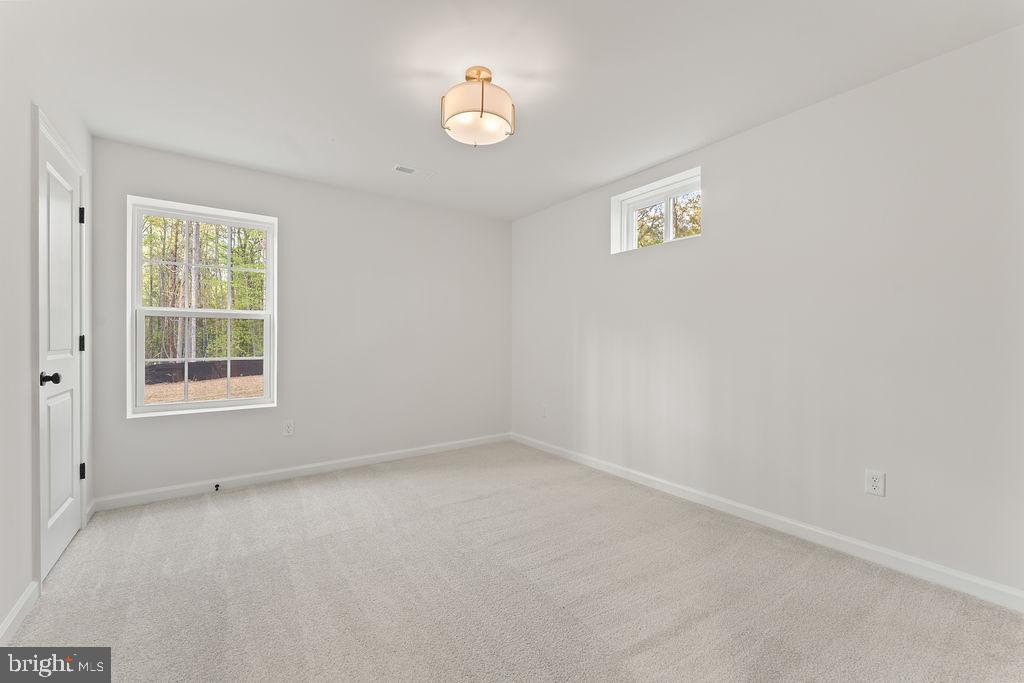 729 Vawter Corner Road Louisa, VA 23093 - Photo 29 of 50 an empty room with a window