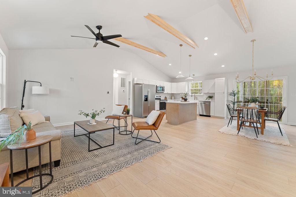 729 Vawter Corner Road Louisa, VA 23093 - Photo 3 of 50 a living room with furniture and a view of kitchen