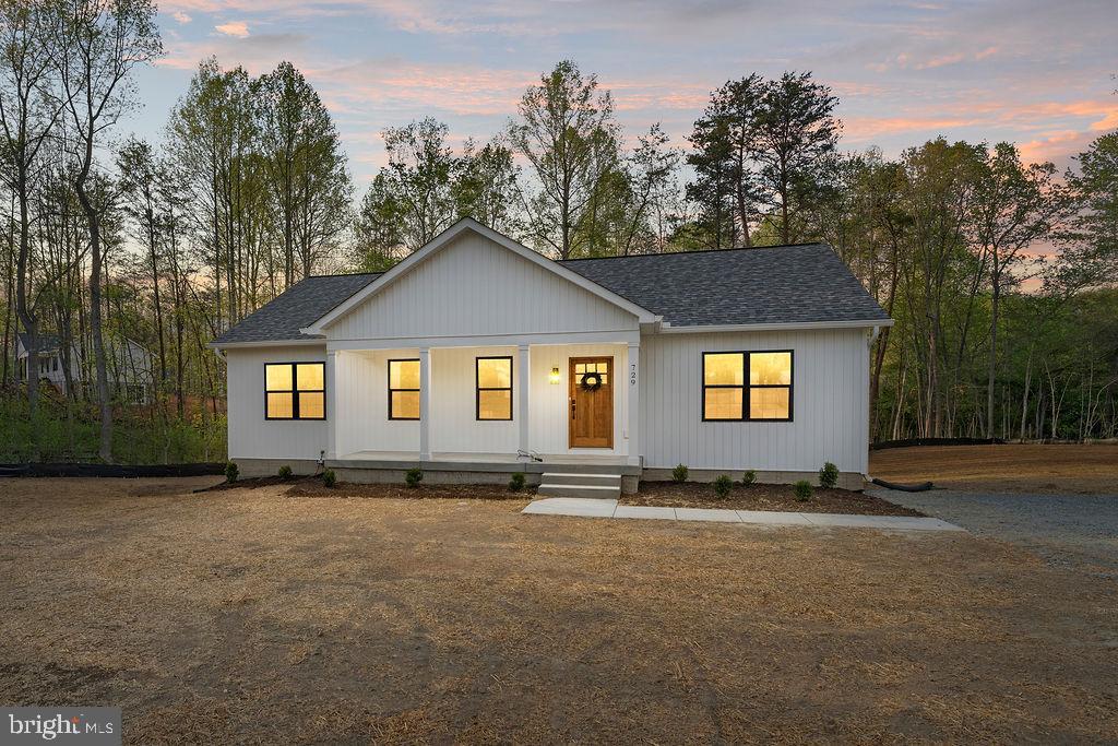 729 Vawter Corner Road Louisa, VA 23093 - Photo 42 of 50 a view of a house with a yard
