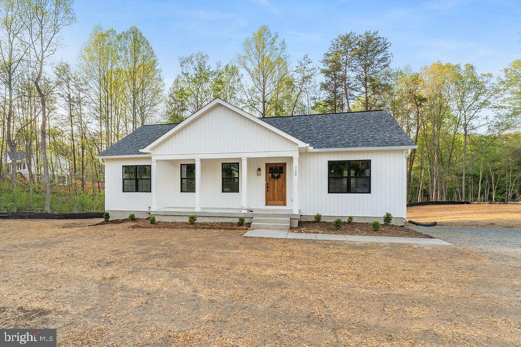729 Vawter Corner Road Louisa, VA 23093 - Photo 44 of 50 a front view of a house with a garden