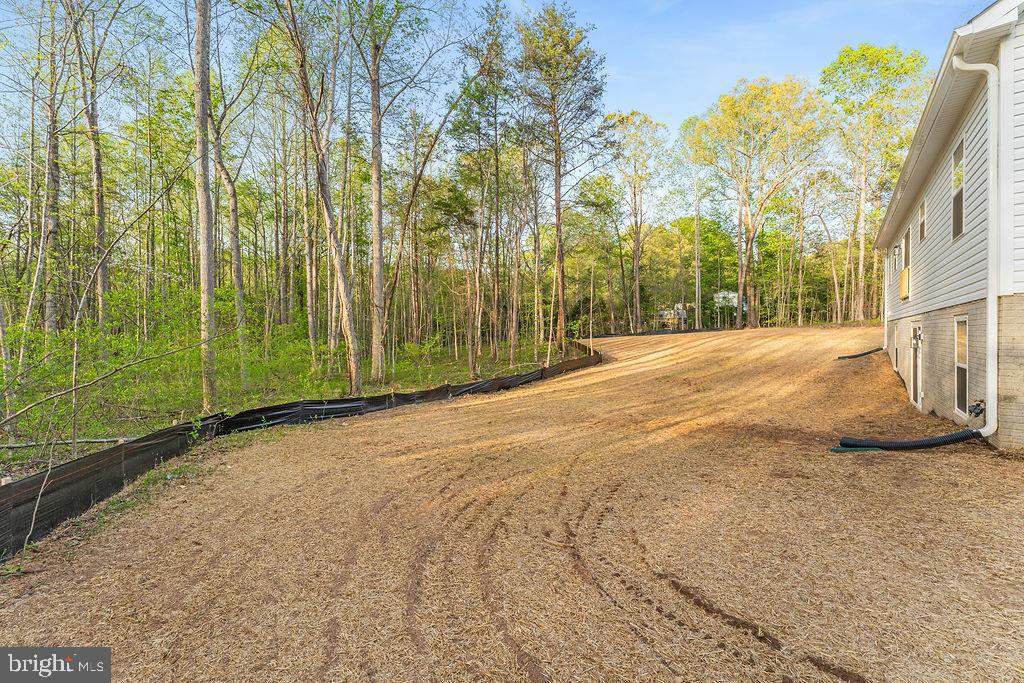 729 Vawter Corner Road Louisa, VA 23093 - Photo 45 of 50 a view of a road with a building in the background
