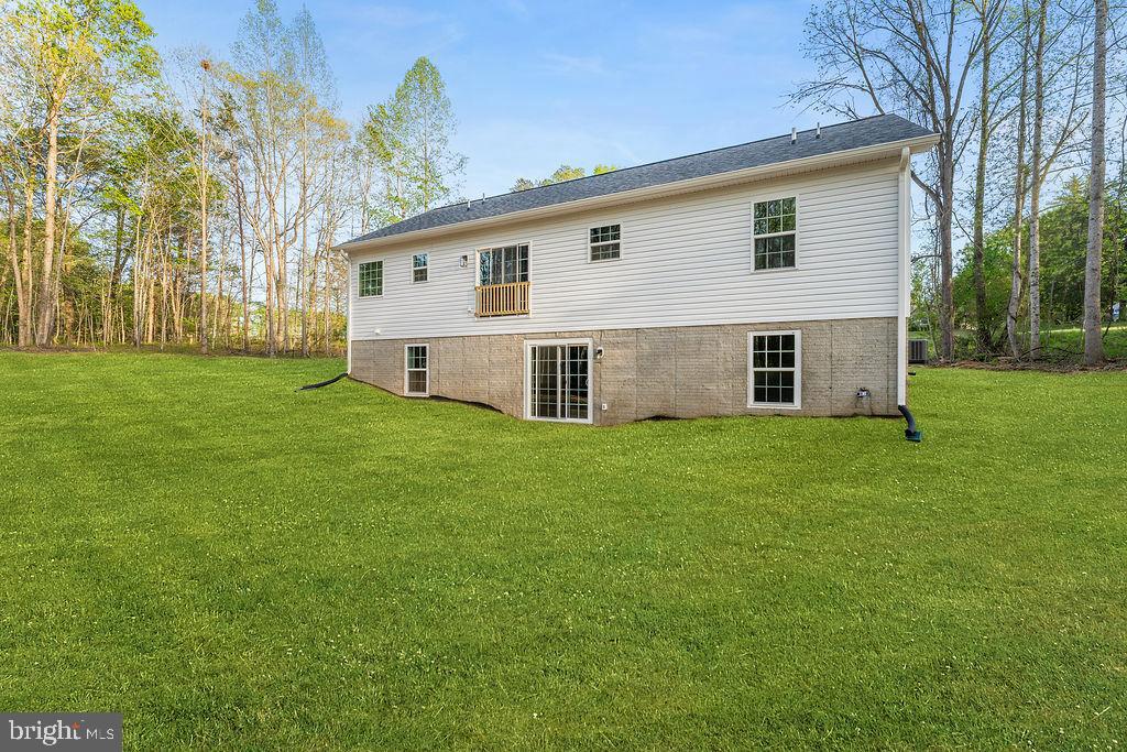 729 Vawter Corner Road Louisa, VA 23093 - Photo 47 of 50 a view of a house with a yard