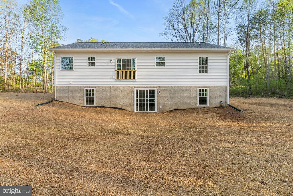 729 Vawter Corner Road Louisa, VA 23093 - Photo 48 of 50 front view of a house with a yard
