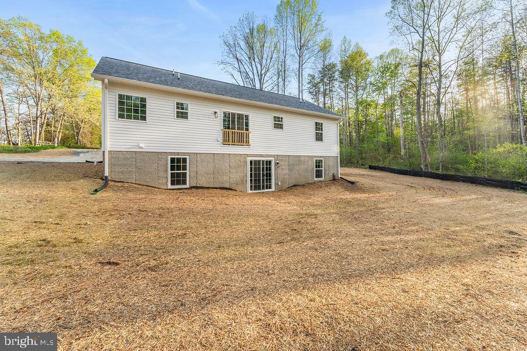 729 Vawter Corner Road Louisa, VA 23093 - Photo 49 of 50 a view of a house with a outdoor space