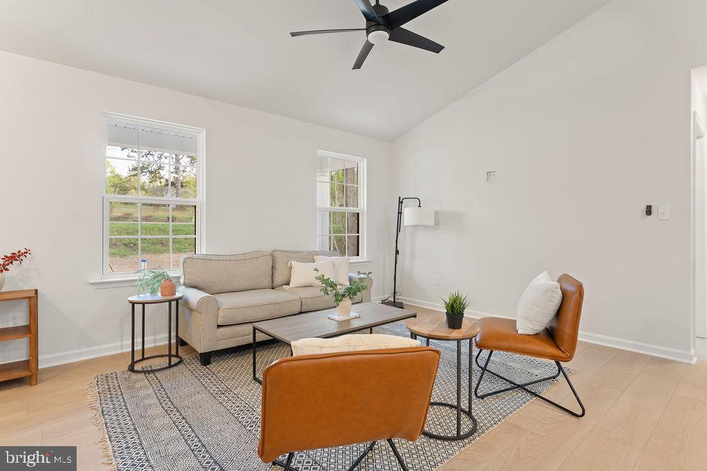 729 Vawter Corner Road Louisa, VA 23093 - Photo 7 of 50 a living room with furniture and a window