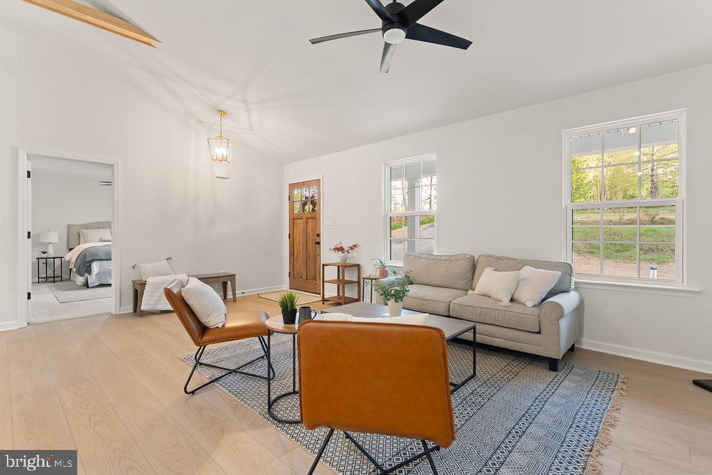 729 Vawter Corner Road Louisa, VA 23093 - Photo 8 of 50 a living room with furniture and a window