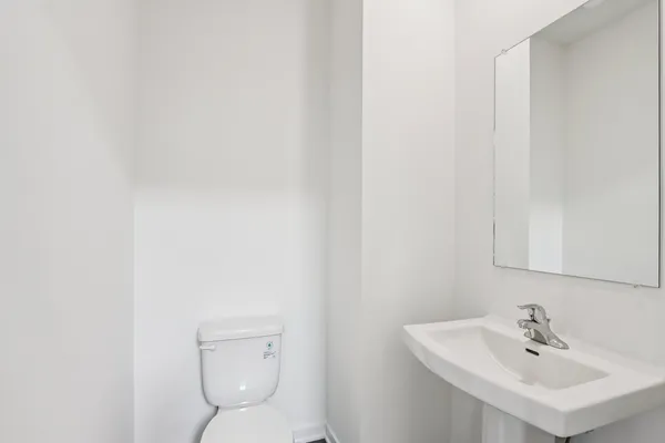 a view of kitchen with wooden floor and electronic appliances