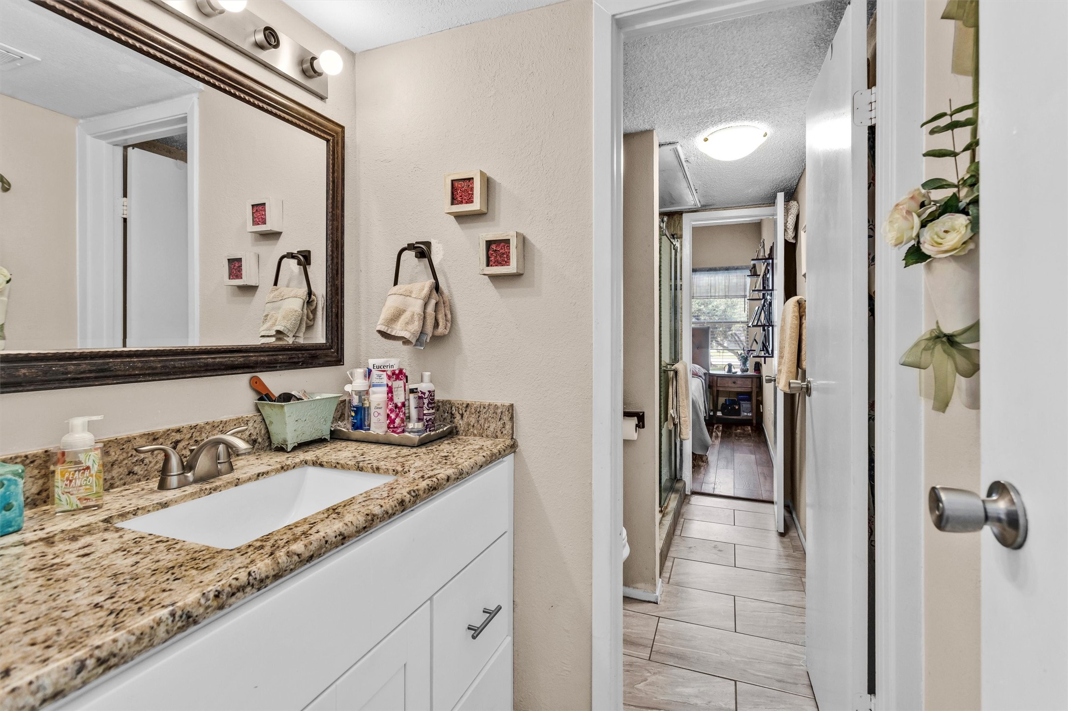 12900 Walden Road, Unit 814H Montgomery, TX 77356 - Photo 24 of 42 Can access the downstairs bathroom from the bedroom and living room