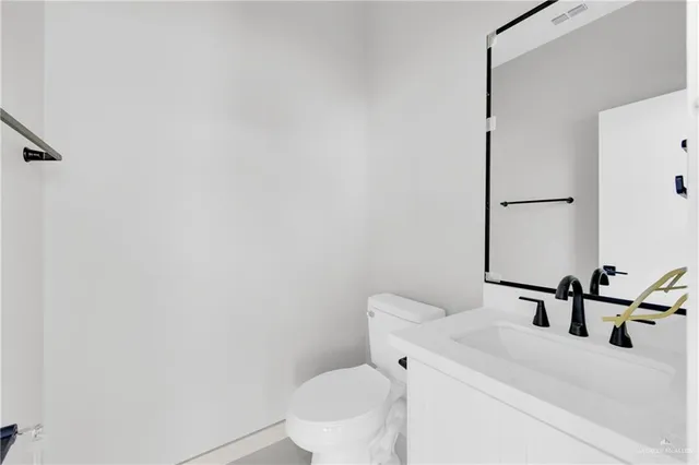 a kitchen with cabinets and window