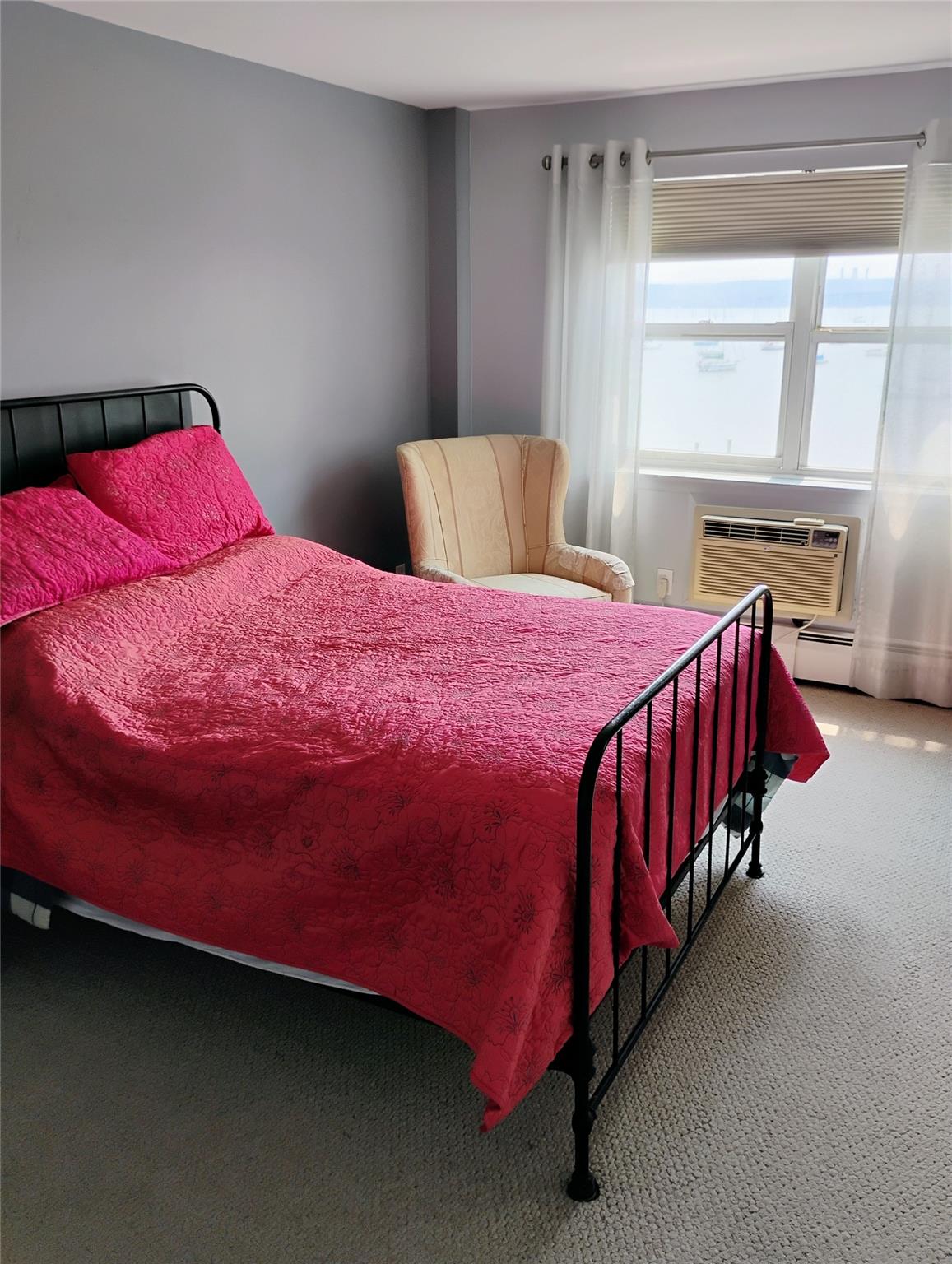 103 Gedney Street, Unit 3B Nyack, NY 10960 - Photo 6 of 11 Bedroom featuring carpet flooring and an AC wall unit