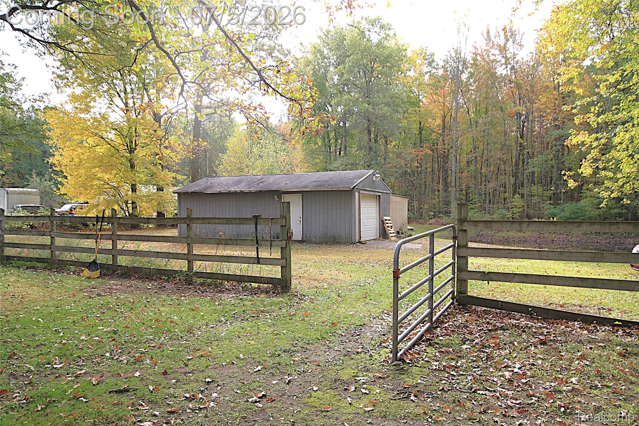 12403 Willard Road Montrose, MI 48457 - Photo 8 of 30 View of yard featuring an outdoor structure and a garage