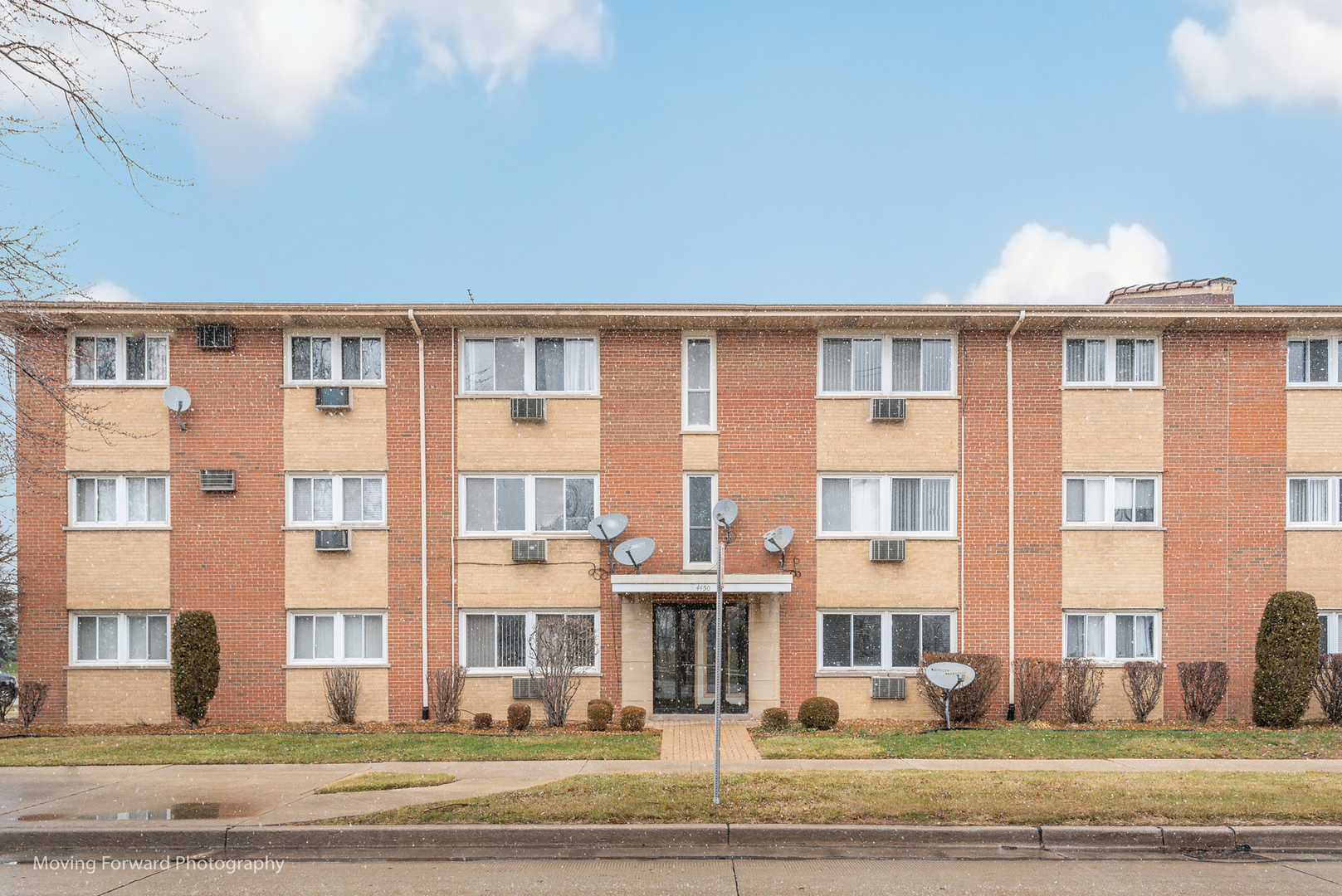 4450 West 111th Street, Unit 20 Oak Lawn, IL 60453 - Photo 1 of 15 a front view of a building with street view