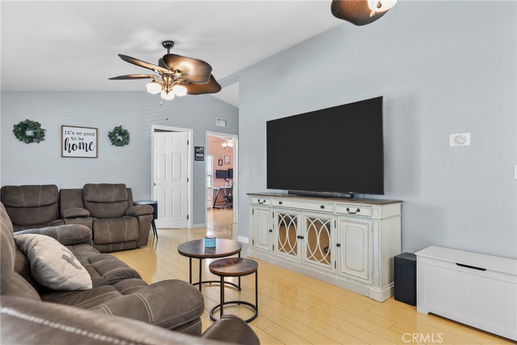 30000 Hasley Canyon Road, Unit 88 Castaic, CA 91384 - Photo 19 of 33 a living room with furniture and a flat screen tv