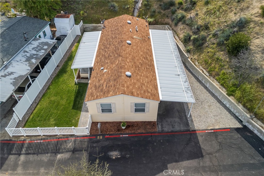 30000 Hasley Canyon Road, Unit 88 Castaic, CA 91384 - Photo 2 of 33 an aerial view of a house with a yard